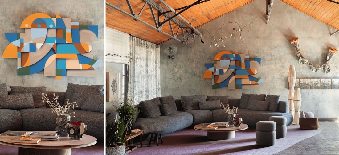 Atendendo como fundo para o sofá, a obra é do artista visual e grafiteiro Marcelo Eco. O papel de parede oportunizou o protagonismo das cores e a percepção de 3D, brincando com cores e a ilusão de ótica | Foto: Denilson Machado | MCA Estúdio